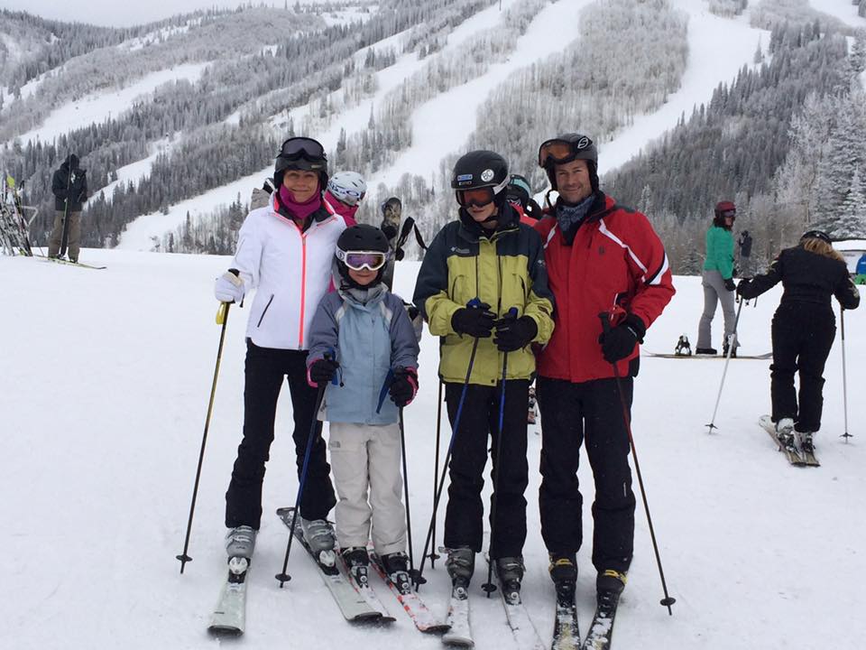 Chris Perry with family skiing