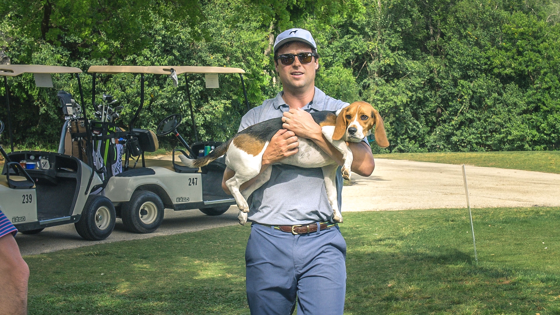 Ben Tolson with his Beagle, Birdie at CBA golf tournament in Austin, Texas